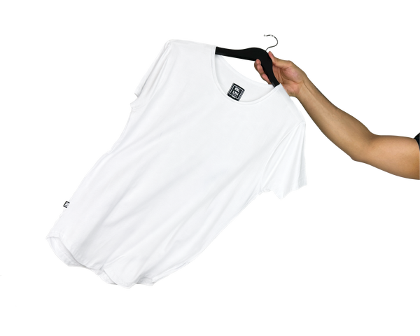 arm holding a polar white short sleeve drop cut t-shirt on a hanger
