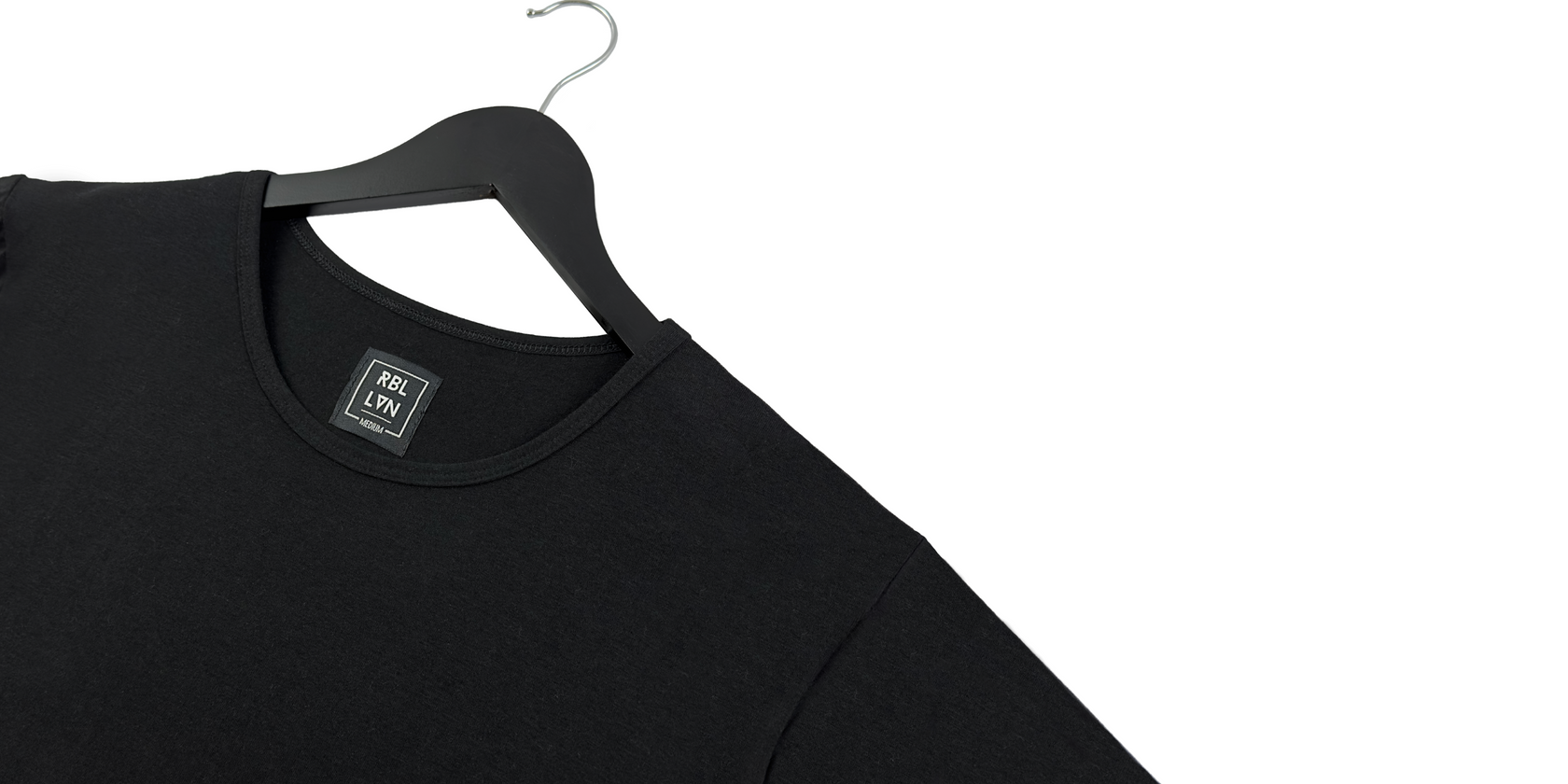 onyx black rebellivn t-shirt that is longline, curved hem, soft, and fitted